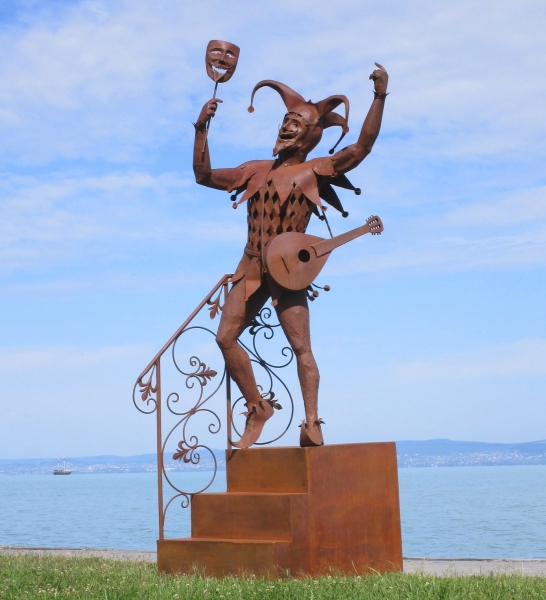 Harlequin garden sculpture Rusty iron
